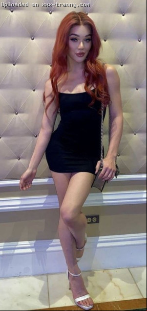 Preview of: Very SEXY Redhead Transgender Woman Wearing a HOT Black Mini Dress!